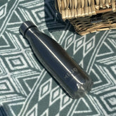 grey water bottle with picnic hamper