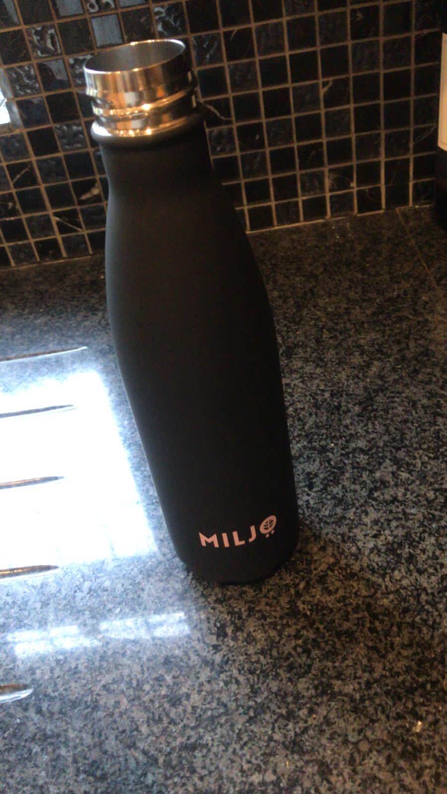 black water bottle on kitchen counter